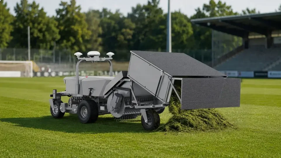 Robotic turf maintenance unit on a sports field